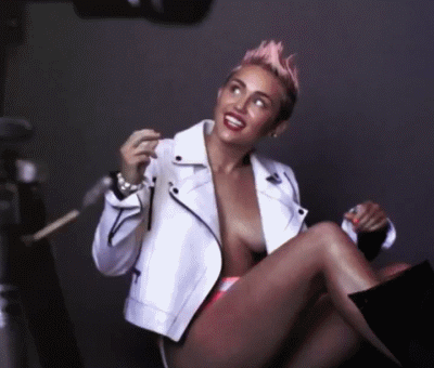 Miley cyrus showing tits playing with