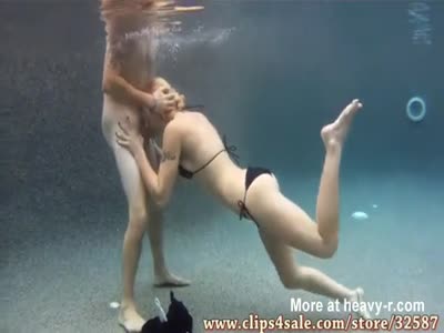 Bondage girl gets breaths underwater