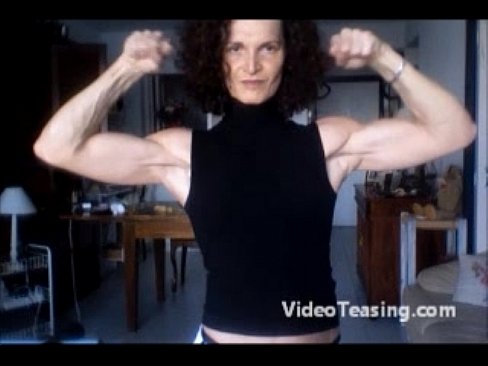 Sexy granny flexes very biceps