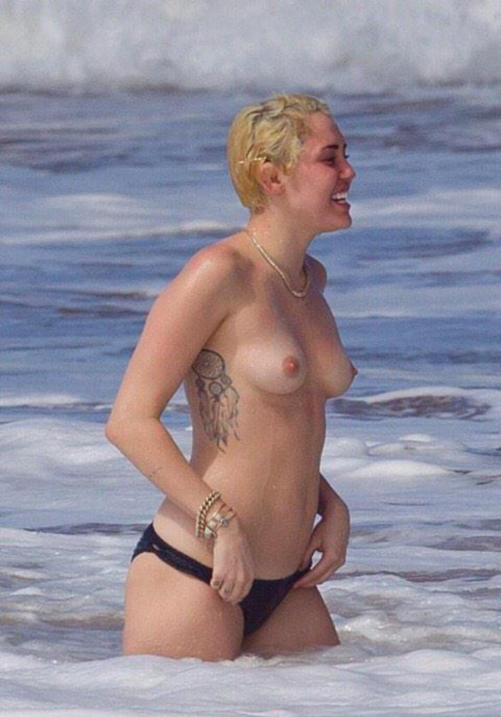 Miley strips touches herself