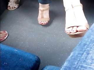 Candid sexy woman feet flat sandals